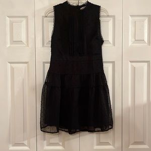 Francesca’s high neck, sleeveless black dress